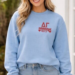 Light Blue Sweatshirt with Red Graphic